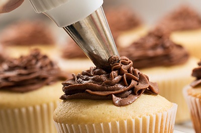 Gluten-Free Vanilla Bean Golden Cupcakes with Milk Chocolate Frosting